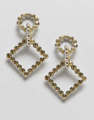 DESIGN earrings with linked crystal shapes in silver